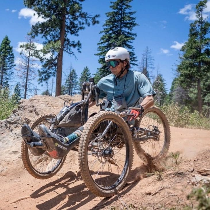 Adaptive Mountain Biking athlete riding singletrack in Lake Tahoe California