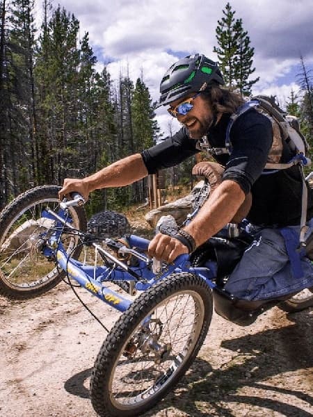 David Poole riding his adaptive mountain bike