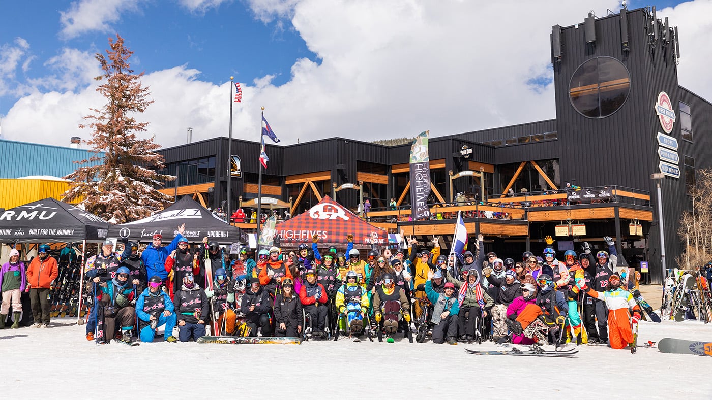 high fives winter ski event group photo