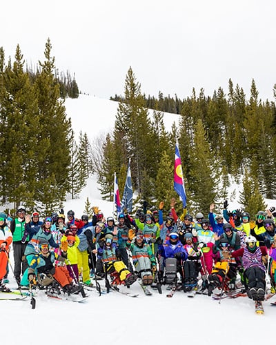 high fives athletes group ski event