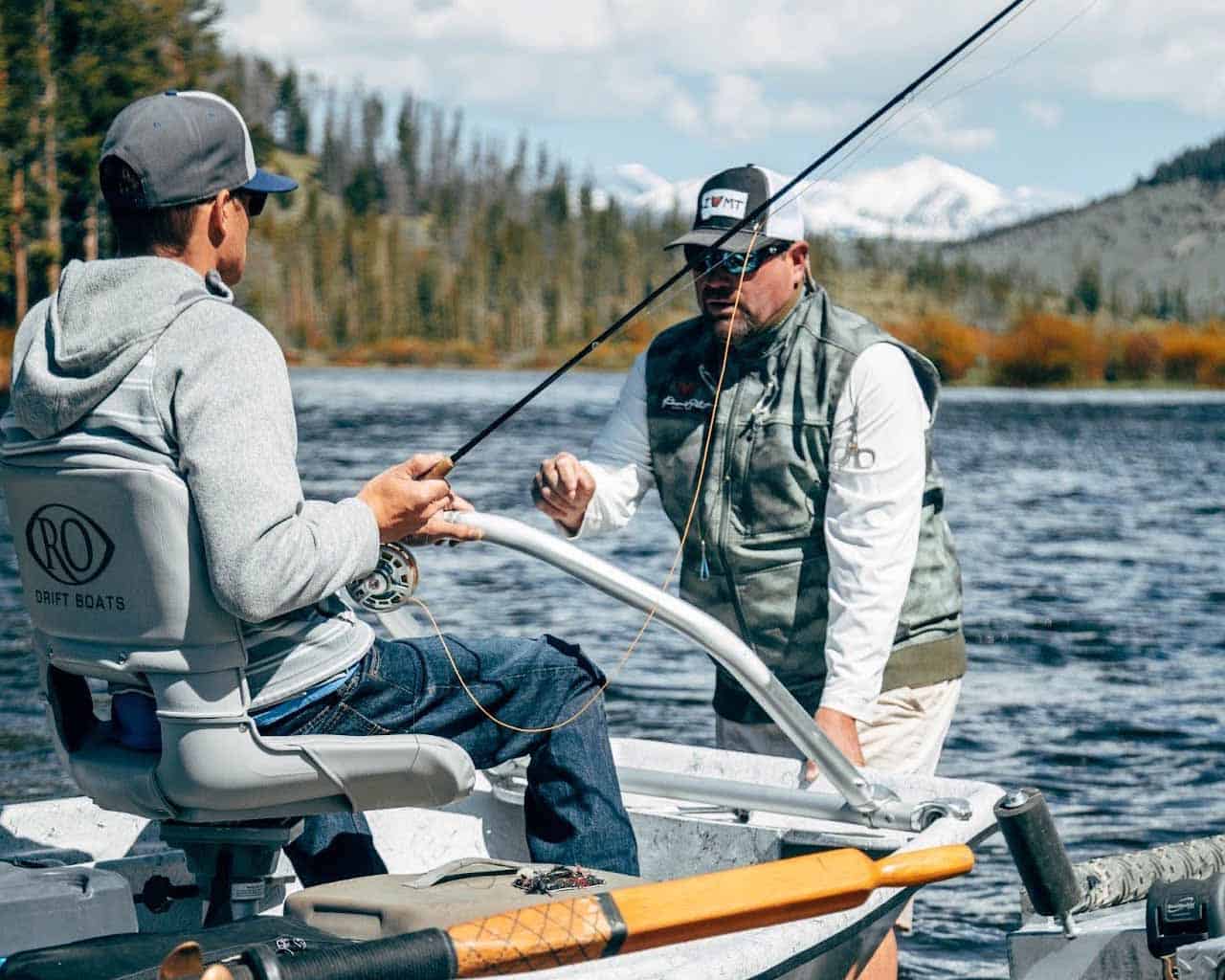 adaptive fisherman and guide on boat montana river